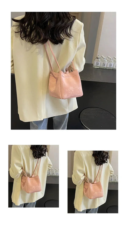 Light Luxury PU Magnetic Buckle Bucket Bag – 2025 Trendy Women's Fashionable Shoulder Bag.