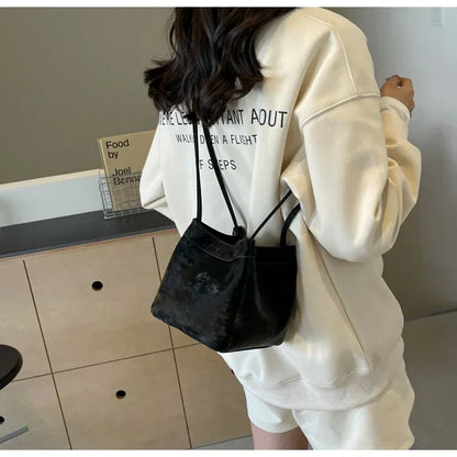 Light Luxury PU Magnetic Buckle Bucket Bag – 2025 Trendy Women's Fashionable Shoulder Bag.