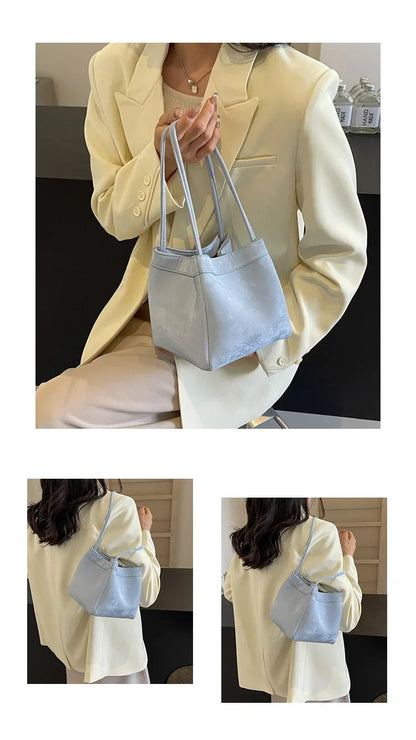 Light Luxury PU Magnetic Buckle Bucket Bag – 2025 Trendy Women's Fashionable Shoulder Bag.